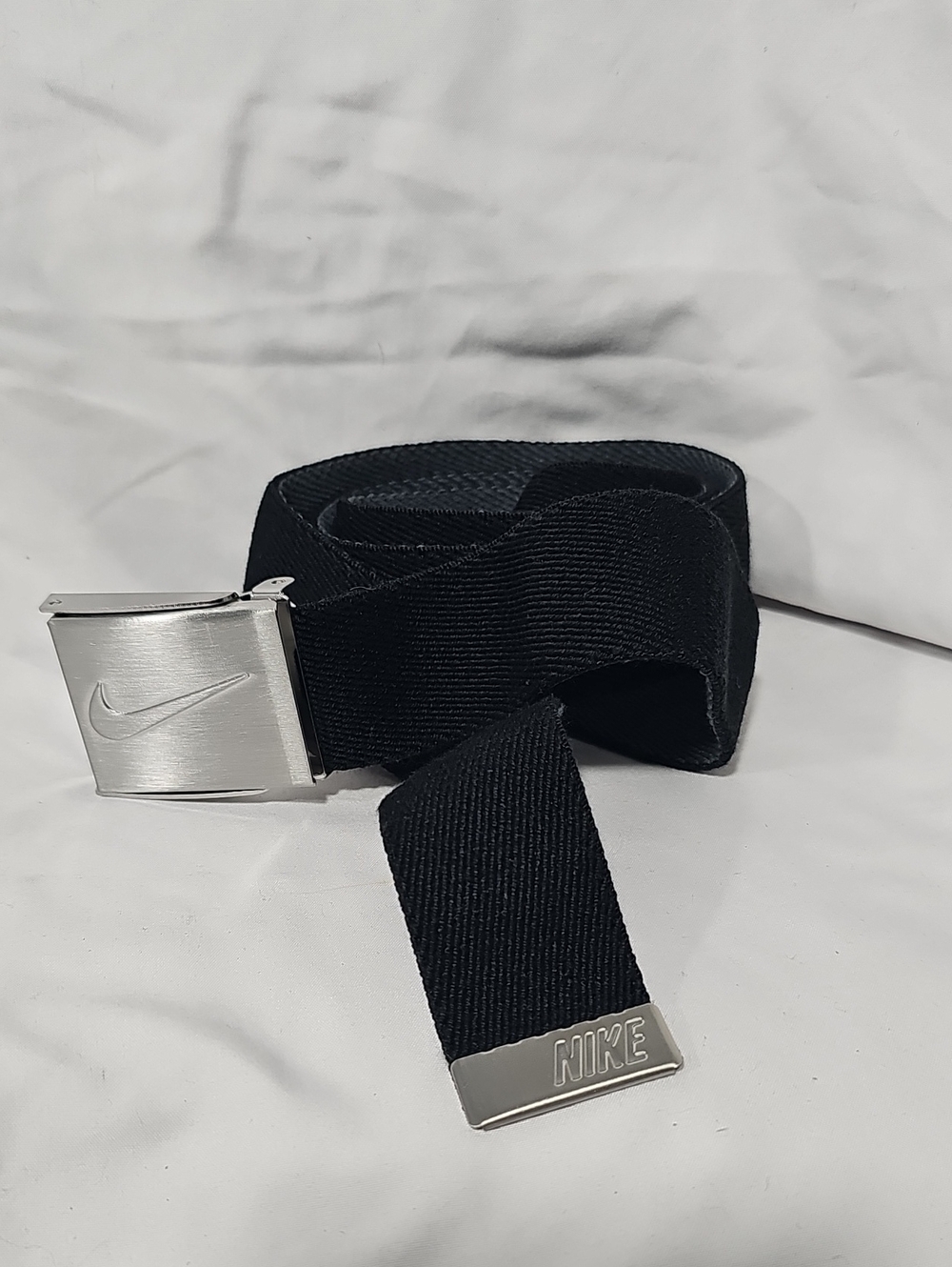Nike Black Webbing Belt with Brushed Silver Buckle and Tip